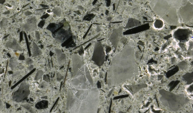 After the sample core has been cut and polished, A TEC Services Inc. petrographer microscopically observes the material to determine potential causes of and solutions to the distress